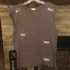 Distressed sleeveless shirt